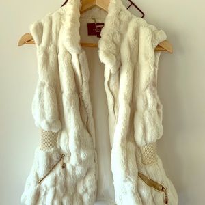 White faux fur vest